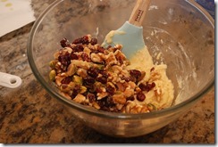Stir in the dried cranberries and nuts