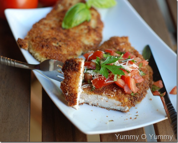 Chicken Parmesan with a tomato basil topping